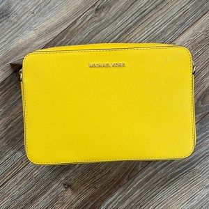 Yellow Michael Kors crossbody.